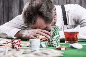 man losing at gambling